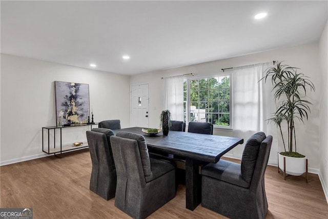 dining room featuring light hardwood / wood-style flooring