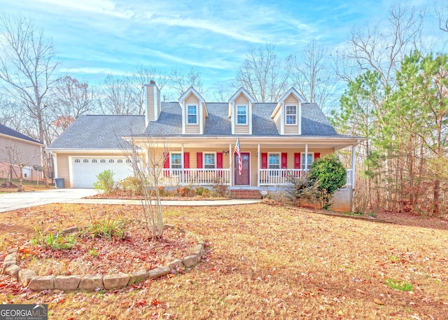 cape cod-style house featuring covered porch and a garage