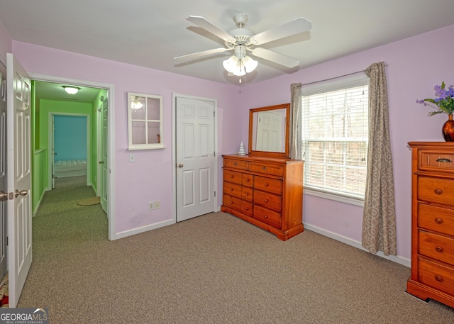 bedroom with light colored carpet and ceiling fan