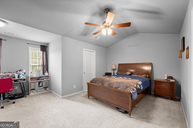 carpeted bedroom featuring ceiling fan and lofted ceiling