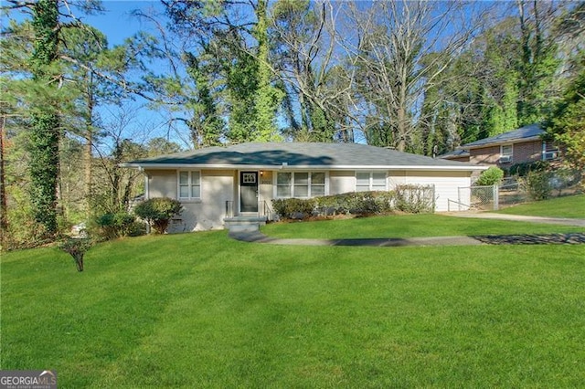 ranch-style home with a front yard