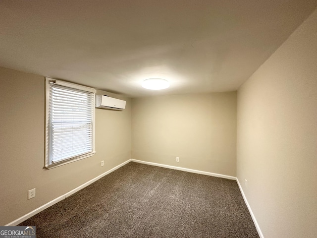 carpeted spare room featuring a wall mounted AC