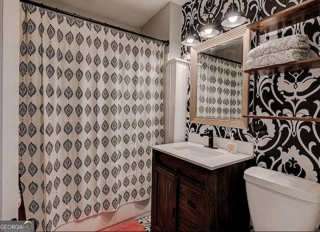 bathroom with vanity and toilet