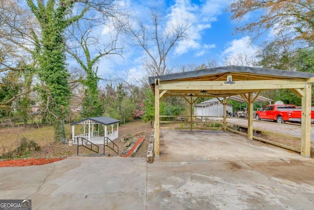 view of patio / terrace featuring a carport