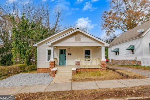 bungalow-style home featuring covered porch