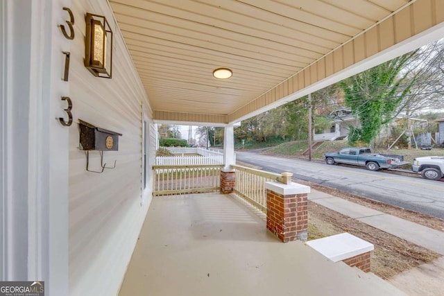 view of patio featuring a porch