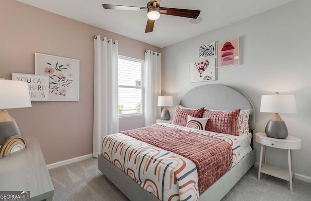 carpeted bedroom with ceiling fan