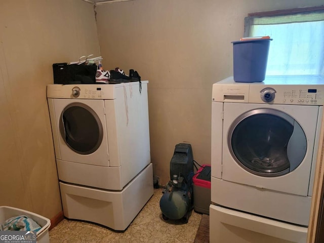 laundry room featuring separate washer and dryer