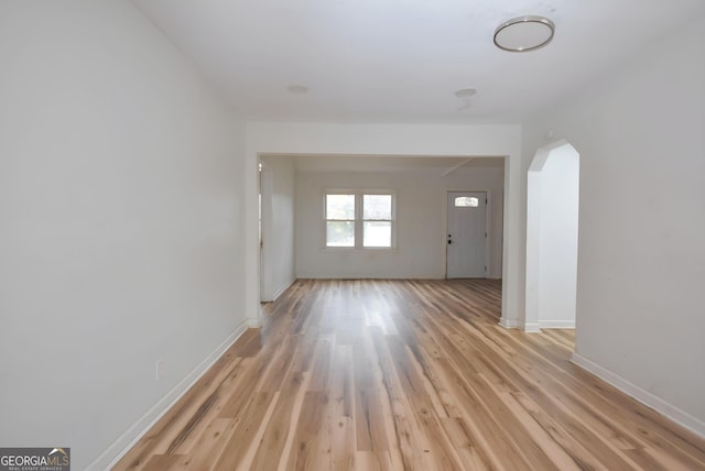 spare room with light hardwood / wood-style flooring