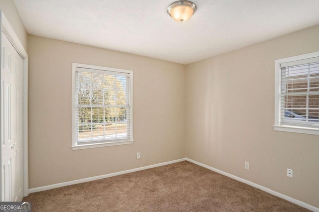 view of carpeted spare room