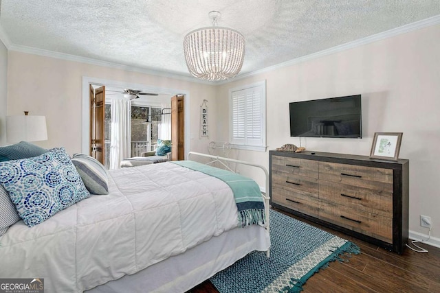 bedroom featuring ornamental molding, a textured ceiling, an inviting chandelier, and dark wood-type flooring