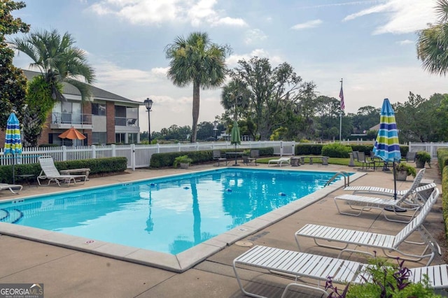 view of pool featuring a patio area