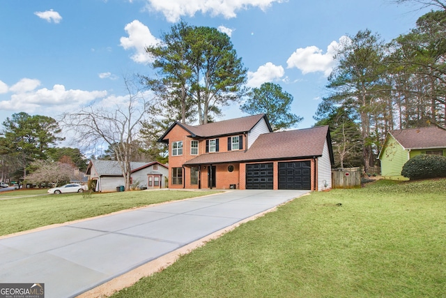 view of front of property with a garage and a front lawn