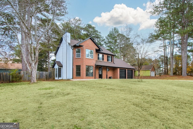 back of house featuring a yard