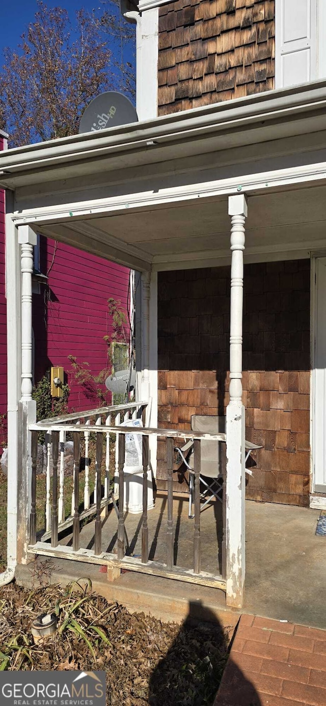 view of patio featuring a porch