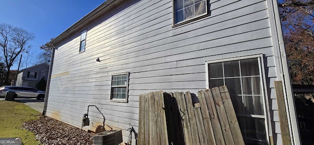 view of property exterior featuring central air condition unit