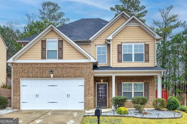 view of front of property featuring a garage