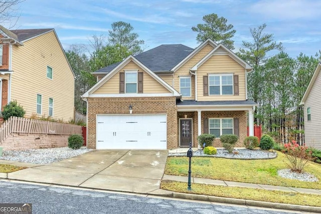 craftsman-style home featuring a garage and a front lawn