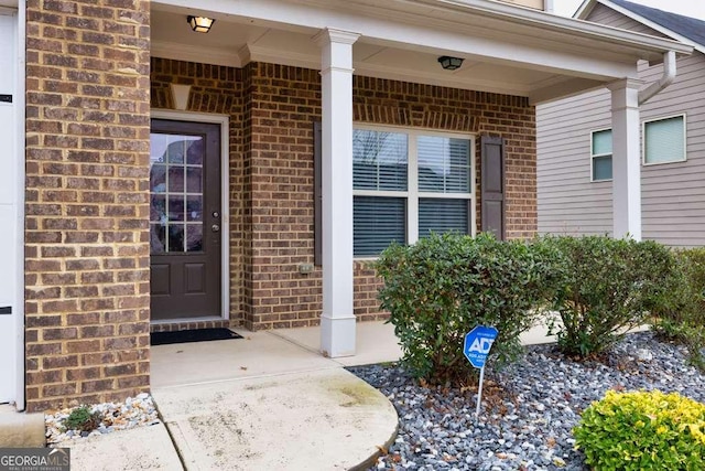 property entrance with a porch