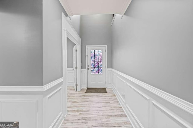 doorway to outside featuring light wood-type flooring