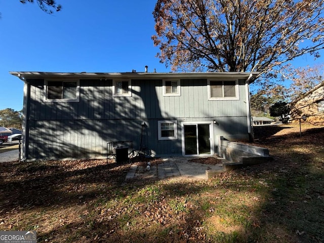 back of house with a patio area