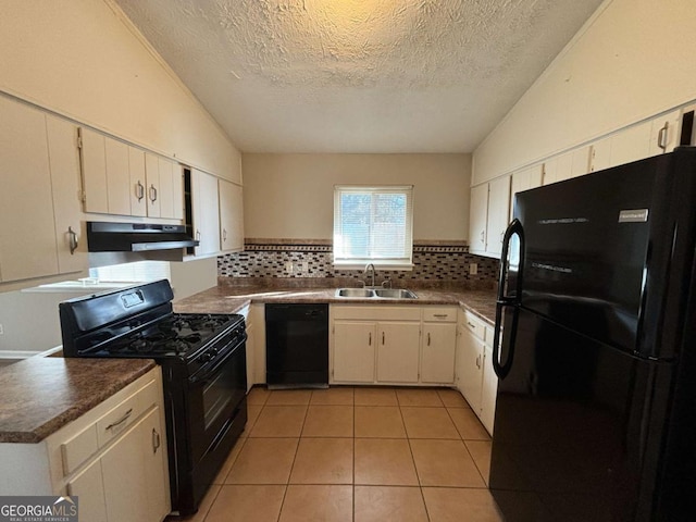 kitchen with black appliances, a textured ceiling, white cabinetry, extractor fan, and sink