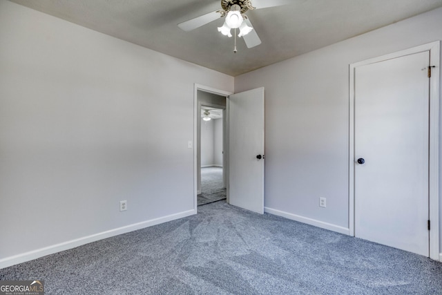 unfurnished bedroom with carpet flooring and ceiling fan