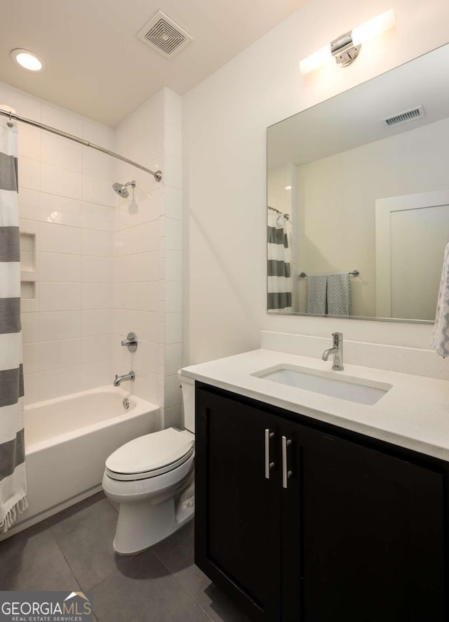 full bathroom with tile patterned flooring, vanity, toilet, and shower / bathtub combination with curtain