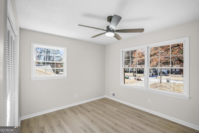 unfurnished bedroom featuring a closet, ceiling fan, and light hardwood / wood-style flooring