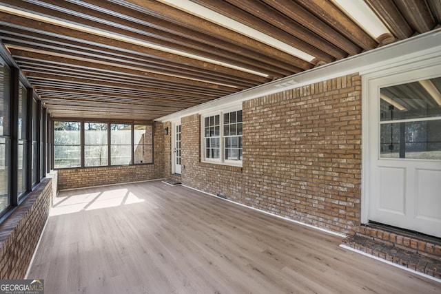 view of unfurnished sunroom