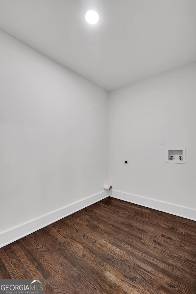 unfurnished room with hardwood / wood-style flooring