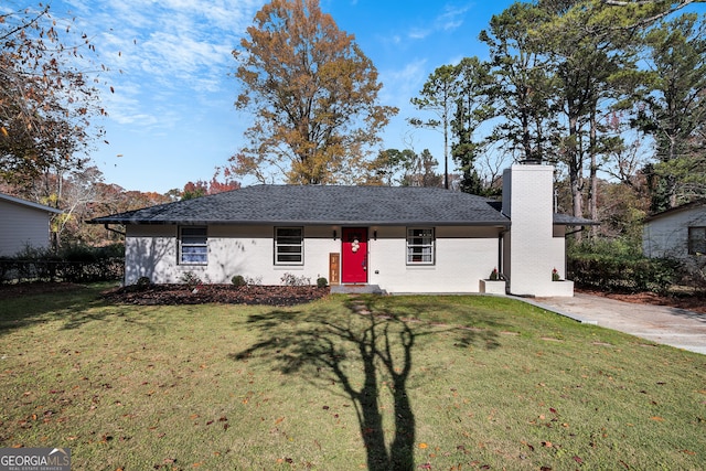 ranch-style house with a front lawn