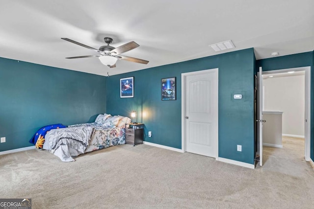 unfurnished bedroom with ceiling fan and light carpet