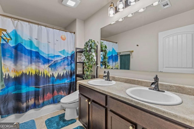 full bathroom with tile patterned flooring, vanity, toilet, and shower / bathtub combination with curtain