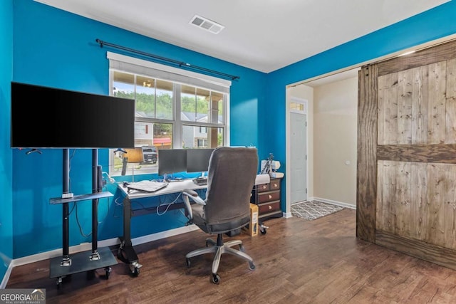 office with dark hardwood / wood-style flooring