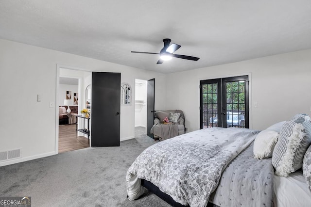 carpeted bedroom with access to exterior, french doors, and ceiling fan