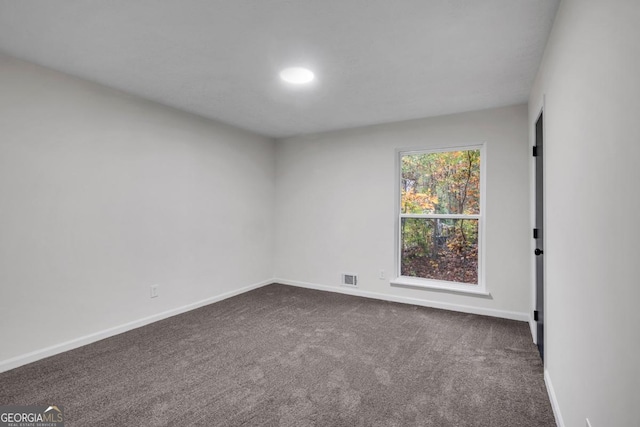 view of carpeted spare room