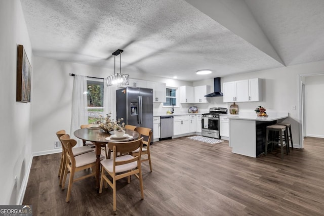 dining area featuring dark hardwood / wood-style flooring