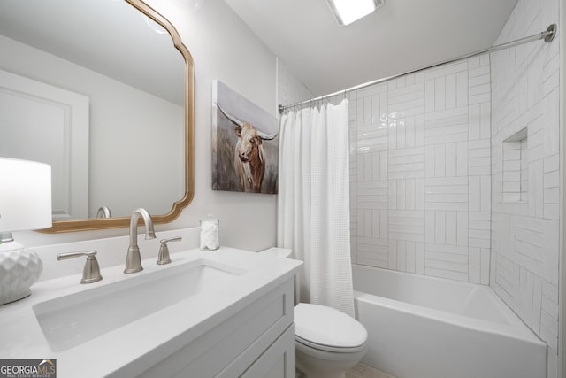 full bathroom with vanity, toilet, and shower / tub combo with curtain