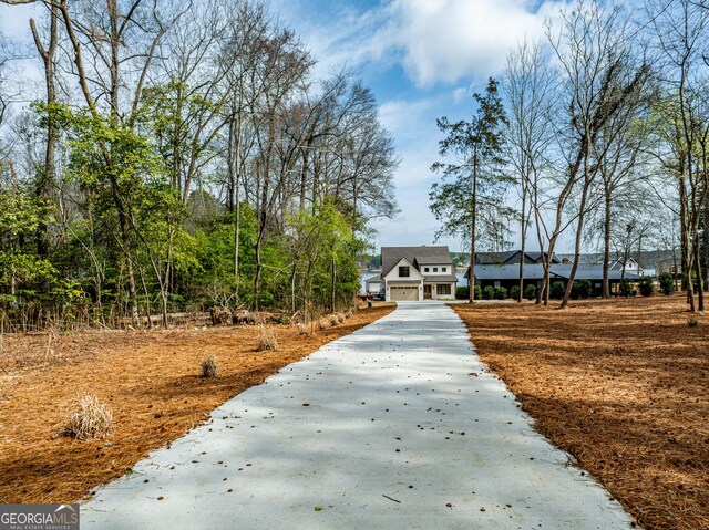 surrounding community with driveway