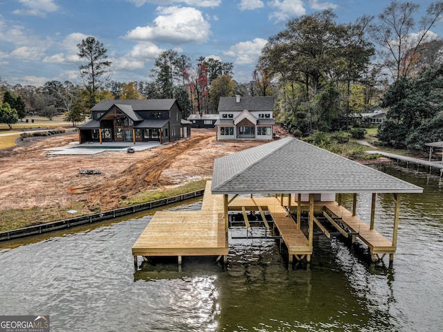 view of dock with a water view