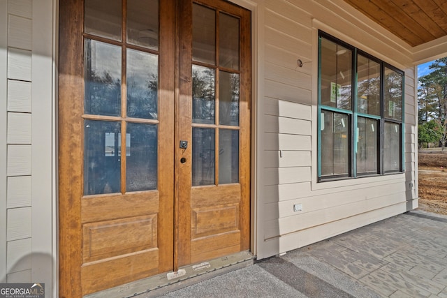 doorway to property featuring french doors