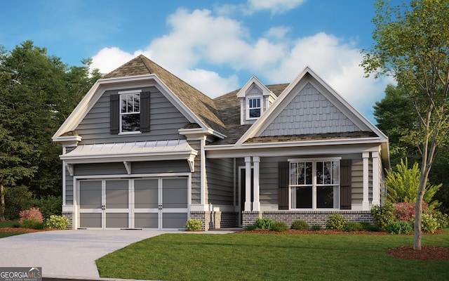 craftsman house featuring a garage and a front lawn