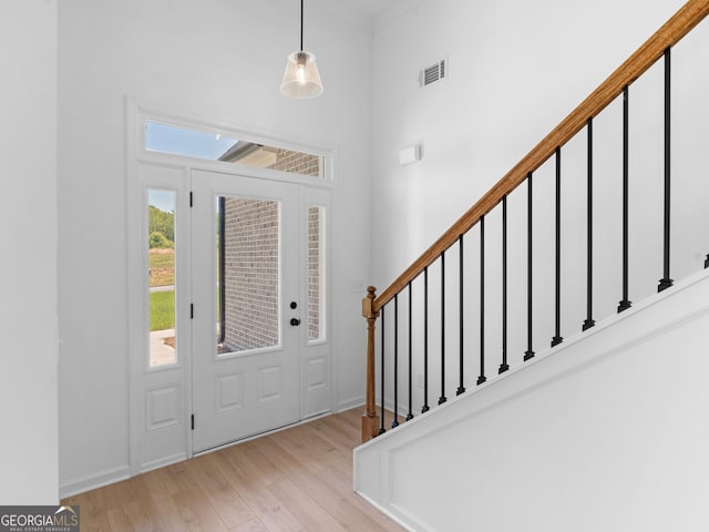 1215 White Oak Way, Griffin, GA 30224 - foyer with wood finished floors, a high ceiling, and stairway
