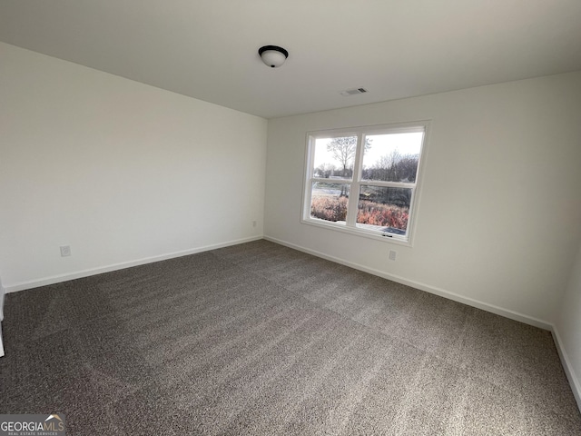 empty room with carpet floors