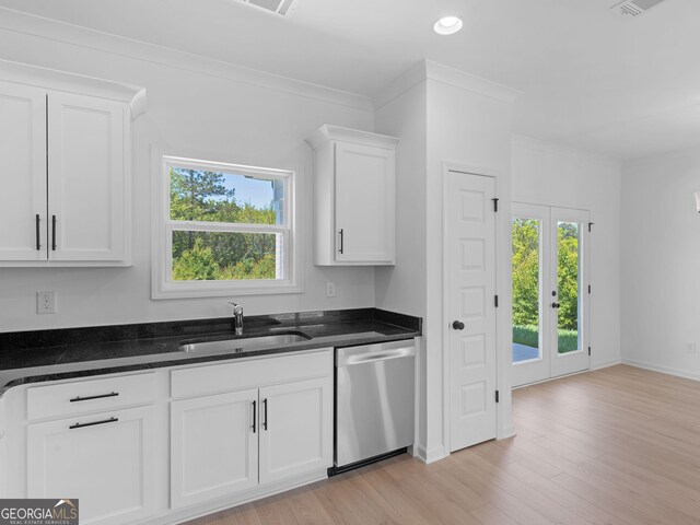 1215 White Oak Way, Griffin, GA 30224 - kitchen featuring dishwasher, a sink, white cabinetry, crown molding, and light wood-style floors