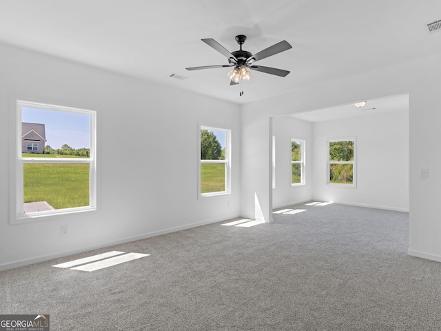 1215 White Oak Way, Griffin, GA 30224 - carpeted spare room with baseboards and a ceiling fan