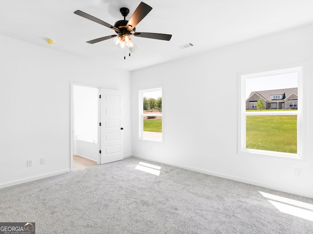 1215 White Oak Way, Griffin, GA 30224 - carpeted empty room with ceiling fan and baseboards