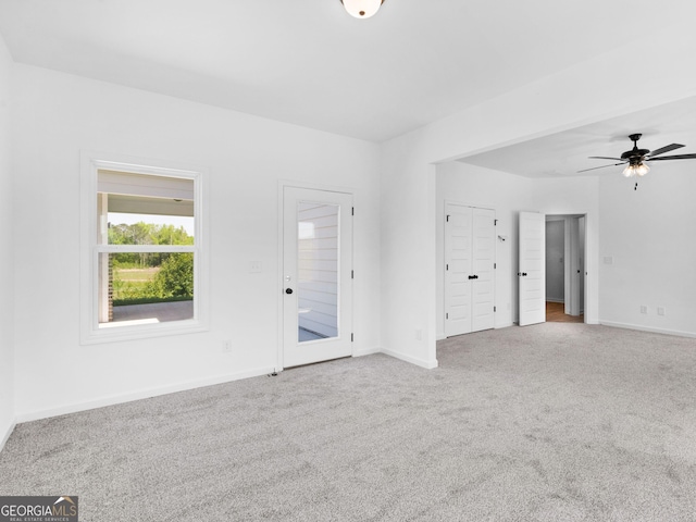 1215 White Oak Way, Griffin, GA 30224 - empty room with carpet flooring, ceiling fan, and baseboards