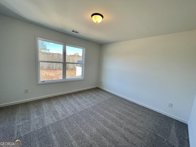 view of carpeted spare room